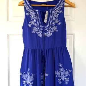 NWT Bebe dress, size 0.  Blue with white embroidery.